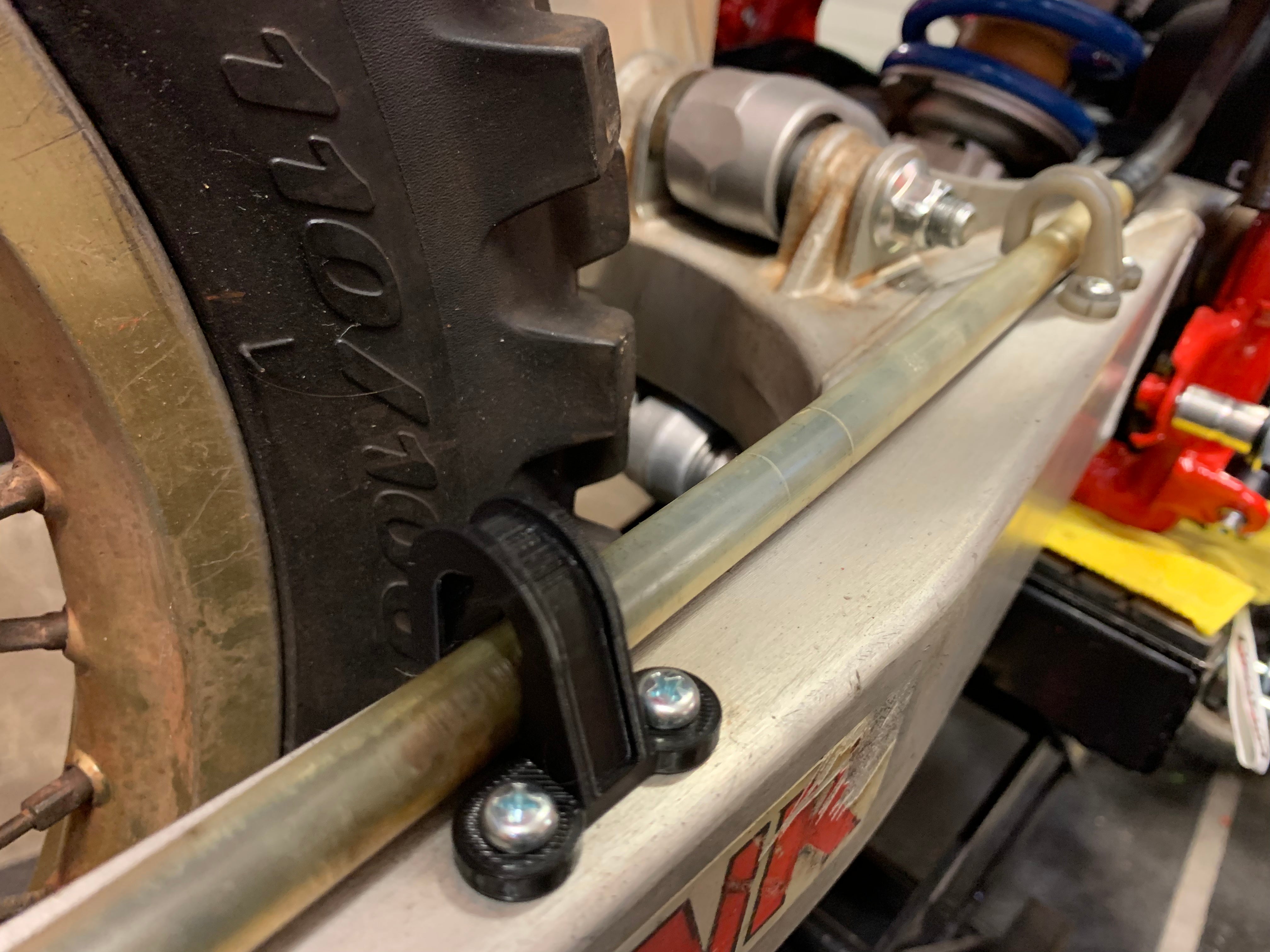 CR/XR Rear Brake Line Guide image 0